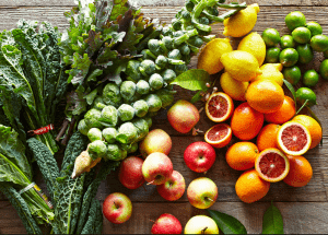 a group of fruits and vegetables on a wood surface Healthy Weight Loss Diets West Malling